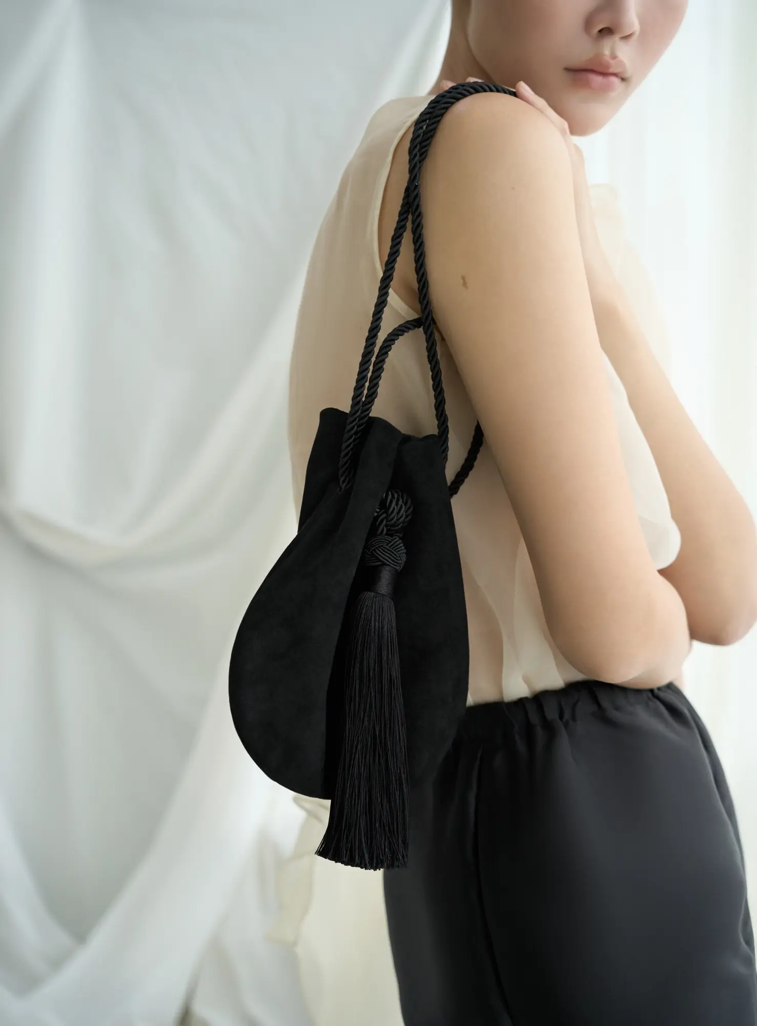 Himo 01 - Limited Black Suede Signature Knot — product photograph